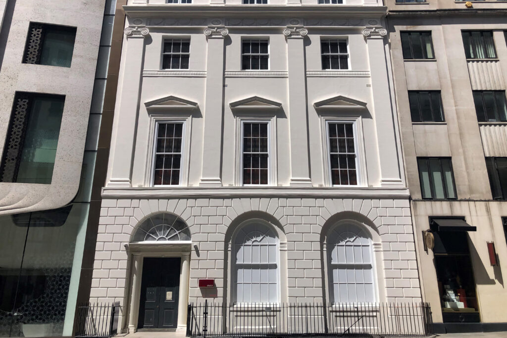 Styles Façade Solutions® presents the fully restored and redecorated façade of 9 Conduit Street, London, showcasing crisp Ionic detailing and pedimented windows. With all repairs complete and fresh paintwork applied, the building's Georgian architectural character has been beautifully revived and preserved.