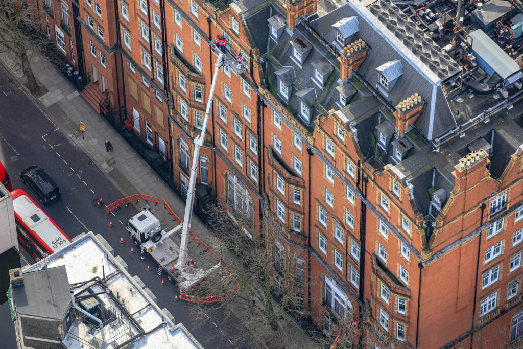 Styles Façade Solutions® delivers an efficient, minimally disruptive window redecoration at The Landmark London using MEWPs in place of scaffolding. This aerial view highlights the speed, precision, and reduced street disruption achieved across the hotel's 1,000+ windows.