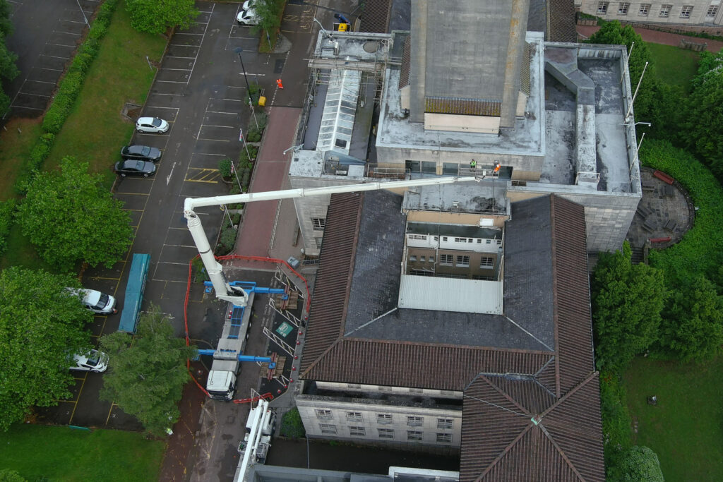 Styles Façade Solutions® deploys its long reach MEWP to access Newport Civic Centre's Grade II* listed rooftop and clock tower.