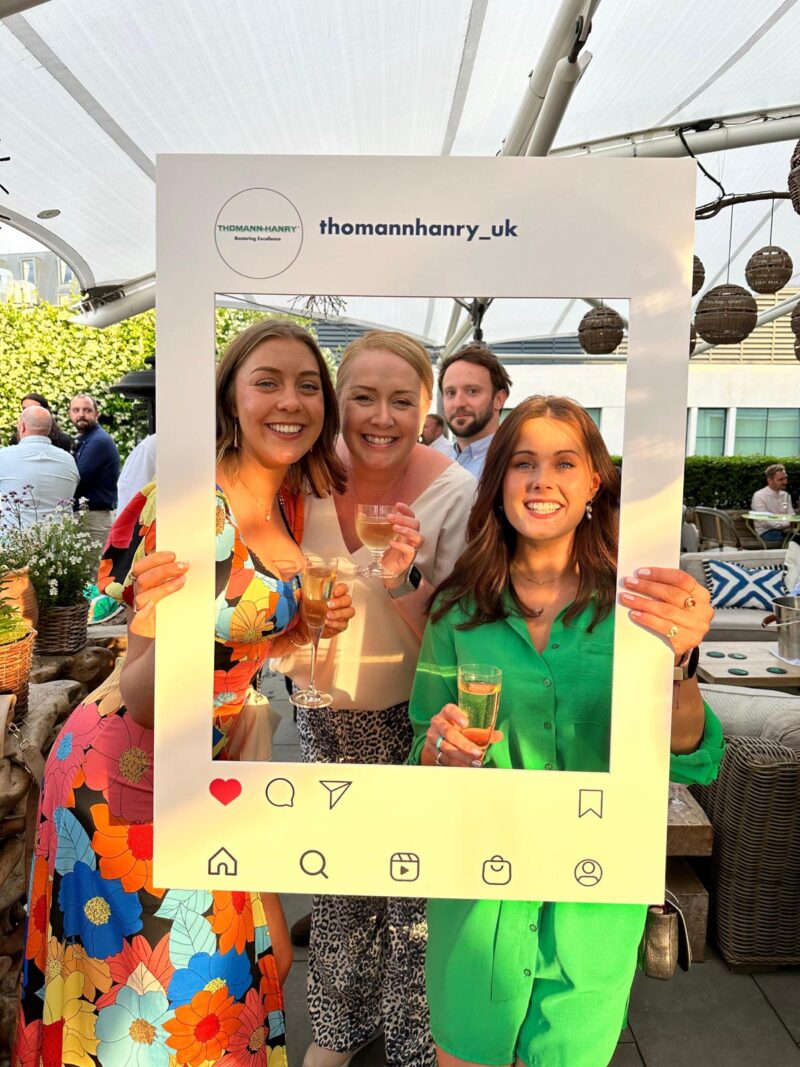 Attendees enjoying summer party Thomann-Hanry