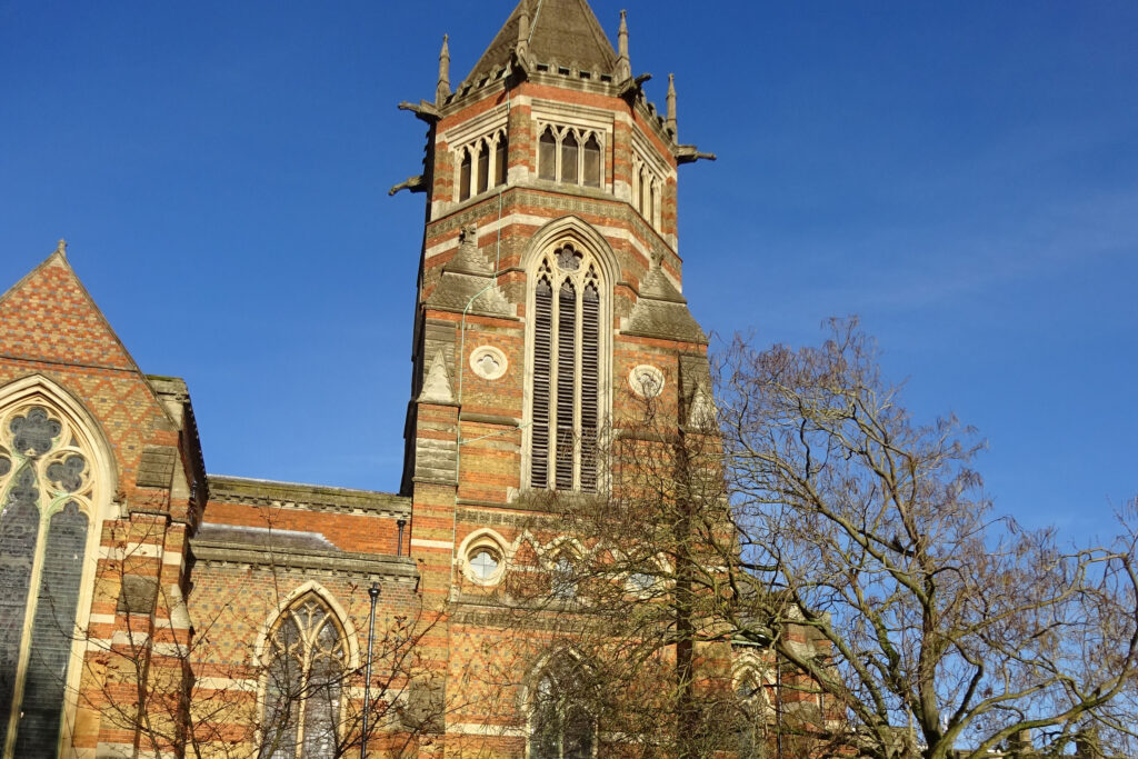 Styles Façade Solutions® prepares to survey the Grade I listed Rugby School Chapel in Rugby. The ornate Gothic Revival tower, with its patterned brickwork, gargoyles and tracery windows.