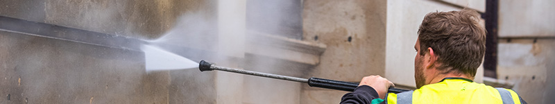 Close up image of cleaning of the façade of a commercial building