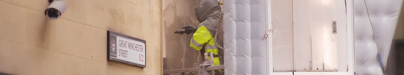 Close up image of cleaning of the façade of a commercial building