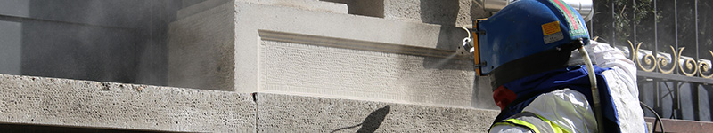 Close up image of cleaning of the façade of a commercial building