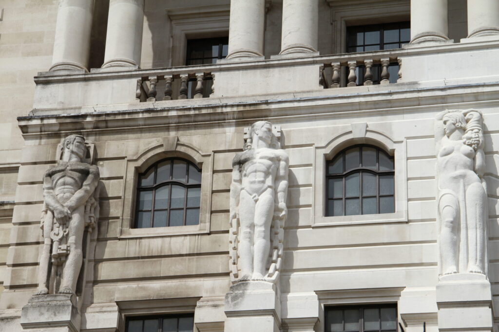 Styles Façade Solutions® revealing the exceptional sculptural detail of the Bank of England's stone figures following Façade Gommage cleaning. The treatment has restored the Portland stone to its original brilliance, dramatically enhancing the visibility of the intricate figurative carvings.