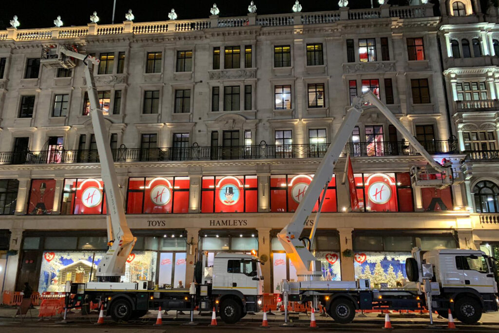 Styles Façade Solutions® carrying out night-time stone masonry and restoration works to the Portland stone façade of Hamleys, Regent Street. The Styles Façade Solutions restoration team work from MWEPs to prevent the store from needing to use costly, unsightly, and invasive scaffolding.