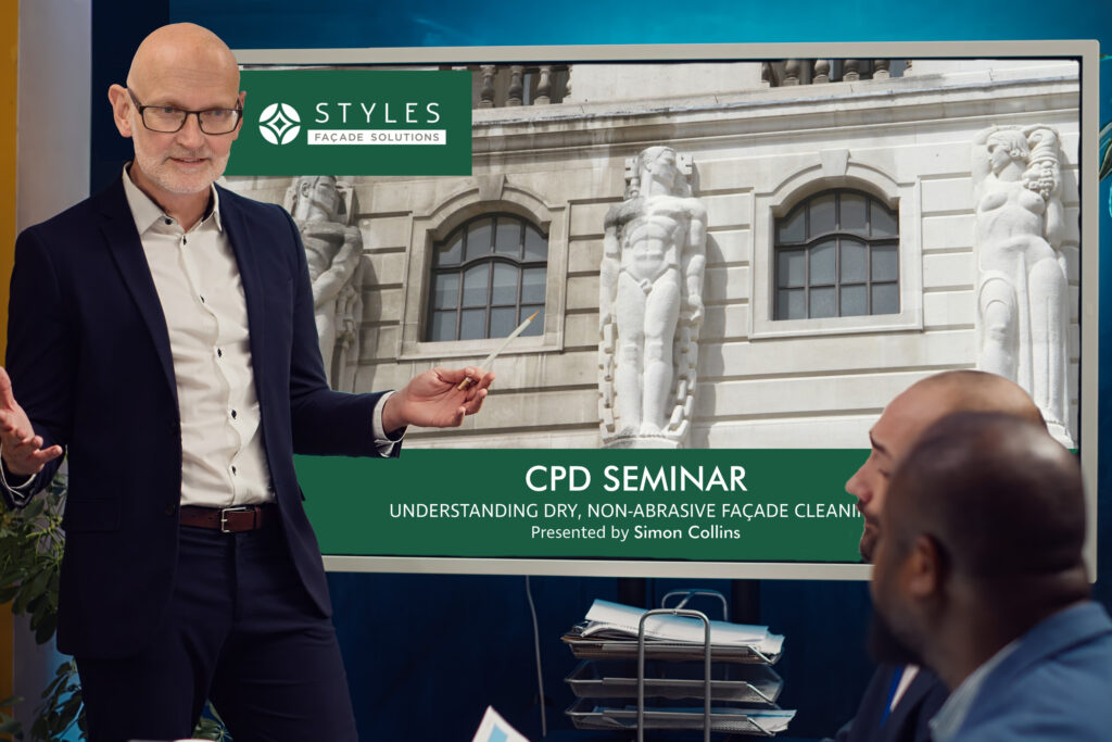 Styles Façade Solutions® delivering an educational CPD seminar on Understanding Dry, Non-Abrasive Façade Cleaning. The session shares expert knowledge on gentle heritage cleaning techniques, using carved stone façade imagery to demonstrate best practice methods for protecting delicate architectural detailing during restoration works.