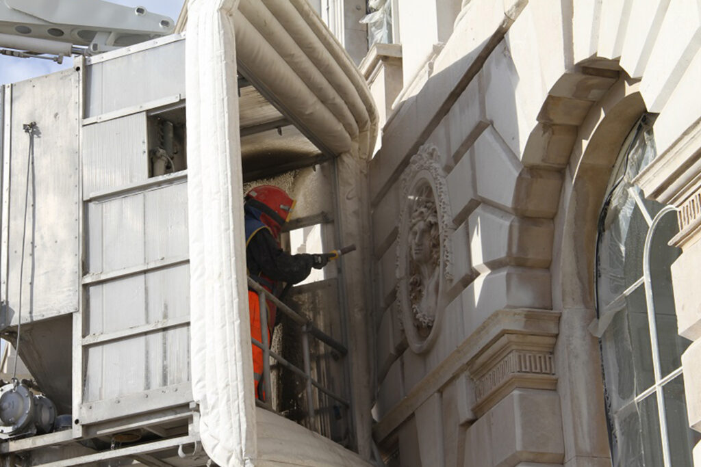 Styles Façade Solutions® delivers precise, scaffold-free cleaning through our unique Façade Gommage process. Gentle yet highly effective, it removes decades of soiling from intricate carved stonework without damaging delicate historic details—restoring heritage buildings like Somerset House to their original beauty, safely, sustainably, and with minimal disruption.